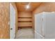 A convenient storage room featuring built in shelving and plenty of storage space at 4309 King Valley Se Dr, Smyrna, GA 30082