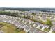 Expansive aerial view showcasing a well-planned residential community with neatly arranged homes and green spaces at 895 Garnet Dr, Acworth, GA 30101