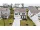 An aerial view showcasing the well-manicured front yard and landscaping of this beautiful two-story home at 895 Garnet Dr, Acworth, GA 30101