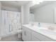 Stylish bathroom equipped with a double sink vanity and a vibrant shower curtain at 895 Garnet Dr, Acworth, GA 30101