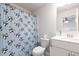 Bright bathroom features a modern vanity and a charming panda-themed shower curtain at 895 Garnet Dr, Acworth, GA 30101