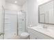 Clean, modern bathroom features a glass-enclosed shower and white fixtures at 895 Garnet Dr, Acworth, GA 30101