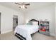 Cozy bedroom with neutral walls, soft carpeting, and a spacious closet at 895 Garnet Dr, Acworth, GA 30101