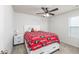 Relaxing bedroom with soft carpeting, large windows, and neutral walls at 895 Garnet Dr, Acworth, GA 30101