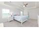 Comfortable main bedroom with a tray ceiling, neutral colors, and lots of natural light at 895 Garnet Dr, Acworth, GA 30101