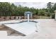 Community splash pool with umbrella fountain and lounging chairs; perfect for hot days at 895 Garnet Dr, Acworth, GA 30101