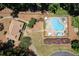 Overhead shot of the community pool and clubhouse with lush landscaping around the perimeter at 1120 Highland Bluff Se Dr, Atlanta, GA 30339