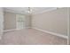 Bright bedroom with a ceiling fan and neutral decor offers a cozy and inviting atmosphere at 1120 Highland Bluff Se Dr, Atlanta, GA 30339