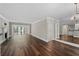 Elegant living room with hardwood floors, fireplace, and access to a balcony at 1120 Highland Bluff Se Dr, Atlanta, GA 30339