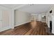 Well-lit living room with hardwood floors offering ample space for relaxation and entertaining at 1120 Highland Bluff Se Dr, Atlanta, GA 30339