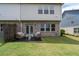 Relax in this backyard with an outdoor patio and seating area, perfect for entertaining or relaxing at 2169 Lanier Harbor Pt, Buford, GA 30518