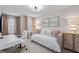 Cozy bedroom with soft colors and a comfortable daybed, perfect for relaxation at 2169 Lanier Harbor Pt, Buford, GA 30518