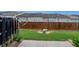 Backyard with a green lawn and wooden fence, perfect for outdoor enjoyment at 2189 Executive Dr, Duluth, GA 30096