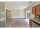 The dining area is bright with a sliding glass door and connects to the kitchen and living space at 2189 Executive Dr, Duluth, GA 30096