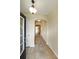 Inviting foyer with neutral paint, a decorative light fixture, and tiled floor leading into the home at 2189 Executive Dr, Duluth, GA 30096