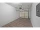 Clean, empty garage with wood floors and plenty of room for storage at 2189 Executive Dr, Duluth, GA 30096