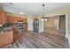 Bright kitchen with stainless steel appliances, granite countertops, and hardwood floors at 2189 Executive Dr, Duluth, GA 30096