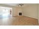 The living room features an elegant fireplace and ample space, transitioning into the dining area at 2189 Executive Dr, Duluth, GA 30096