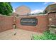 Elegant community sign with brick accents and manicured landscaping, creating a welcoming entrance at 651 Coligny Ct, Atlanta, GA 30350
