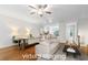 Beautiful open-concept living area with hardwood floors, fireplace, and plenty of space at 651 Coligny Ct, Atlanta, GA 30350
