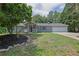Inviting single-story home featuring neat landscaping, a covered porch, and an attached two-car garage at 3181 Woodbridge Ct, Snellville, GA 30039