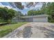 Charming single-story home boasts a well-manicured lawn, large front yard, and two-car garage at 3191 Woodbridge Ct, Snellville, GA 30039