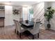 Cozy dining area showcases an elegant table, chairs, and convenient built-in storage solutions at 3790 Village Sw Dr, Atlanta, GA 30331