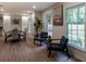 Inviting dining area featuring natural light, contemporary decor, and seamless access to the kitchen at 3790 Village Sw Dr, Atlanta, GA 30331