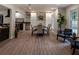 Bright dining room with a modern table set, adjacent to the stylish kitchen and living space at 3790 Village Sw Dr, Atlanta, GA 30331