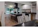 Modern kitchen with a sleek island, barstool seating, and elegant countertops perfect for dining at 3790 Village Sw Dr, Atlanta, GA 30331