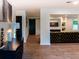Inviting living room boasting wood floors, an elegant fireplace, and sophisticated decor throughout at 3790 Village Sw Dr, Atlanta, GA 30331