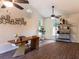 Well-lit office with high ceilings, fan, and a modern desk; perfect for a home workspace at 3790 Village Sw Dr, Atlanta, GA 30331