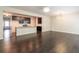 Spacious living room with dark hardwood floors and an open layout to the kitchen at 382 Mulberry Se Row, Atlanta, GA 30354