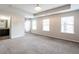 The large main bedroom features carpet and access to the bathroom at 382 Mulberry Se Row, Atlanta, GA 30354