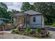 Charming craftsman home featuring a welcoming front porch and landscaped front yard at 5445 Eva Mamie Ln, Stone Mountain, GA 30083