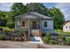Charming craftsman home featuring a welcoming front porch and landscaped front yard at 5445 Eva Mamie Ln, Stone Mountain, GA 30083