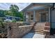 Charming craftsman home featuring a welcoming front porch and landscaped front yard at 5445 Eva Mamie Ln, Stone Mountain, GA 30083