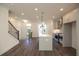 Modern kitchen with stainless steel appliances and hardwood style floors at 626 Skytop Dr # 159, Cumming, GA 30040
