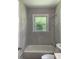 Bathroom featuring a tiled shower-tub combo, providing a clean and functional space at 2245 Polar Rock Sw Ave, Atlanta, GA 30315