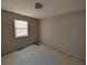 Bedroom with window and overhead lighting awaits your personal design touch at 446 Westbrook Rd, Carrollton, GA 30116