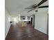 Open-concept living room and kitchen area with stylish flooring and modern finishes at 446 Westbrook Rd, Carrollton, GA 30116