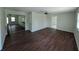 Spacious living room featuring hardwood floors and ample natural light at 446 Westbrook Rd, Carrollton, GA 30116