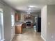 Functional kitchen with stainless steel appliances, oak cabinets, and a view to the back at 5465 Twin Lakes Dr, College Park, GA 30349