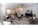 Inviting living room featuring an open concept, modern furniture, and neutral color palette with wood floors at 621 Silva St # 124, Cumming, GA 30040