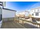 A long wooden deck overlooks neighboring homes in a friendly community at 629 Silva St # 128, Cumming, GA 30040