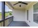 Back porch featuring a ceiling fan and views of the surrounding landscaping and community at 4035 Starwood Dr, Cumming, GA 30028
