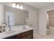 Bathroom featuring dual sinks, granite countertops, and tile floors at 4035 Starwood Dr, Cumming, GA 30028