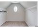 Angled closet featuring an oval window and wire shelving at 4035 Starwood Dr, Cumming, GA 30028