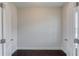 Walk-in closet with ample storage space, clean white walls, and base trim at 4035 Starwood Dr, Cumming, GA 30028