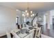 Spacious dining room featuring a modern chandelier and an open floor plan at 4035 Starwood Dr, Cumming, GA 30028